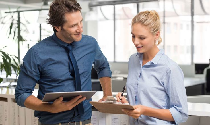 Two office workers in a meeting